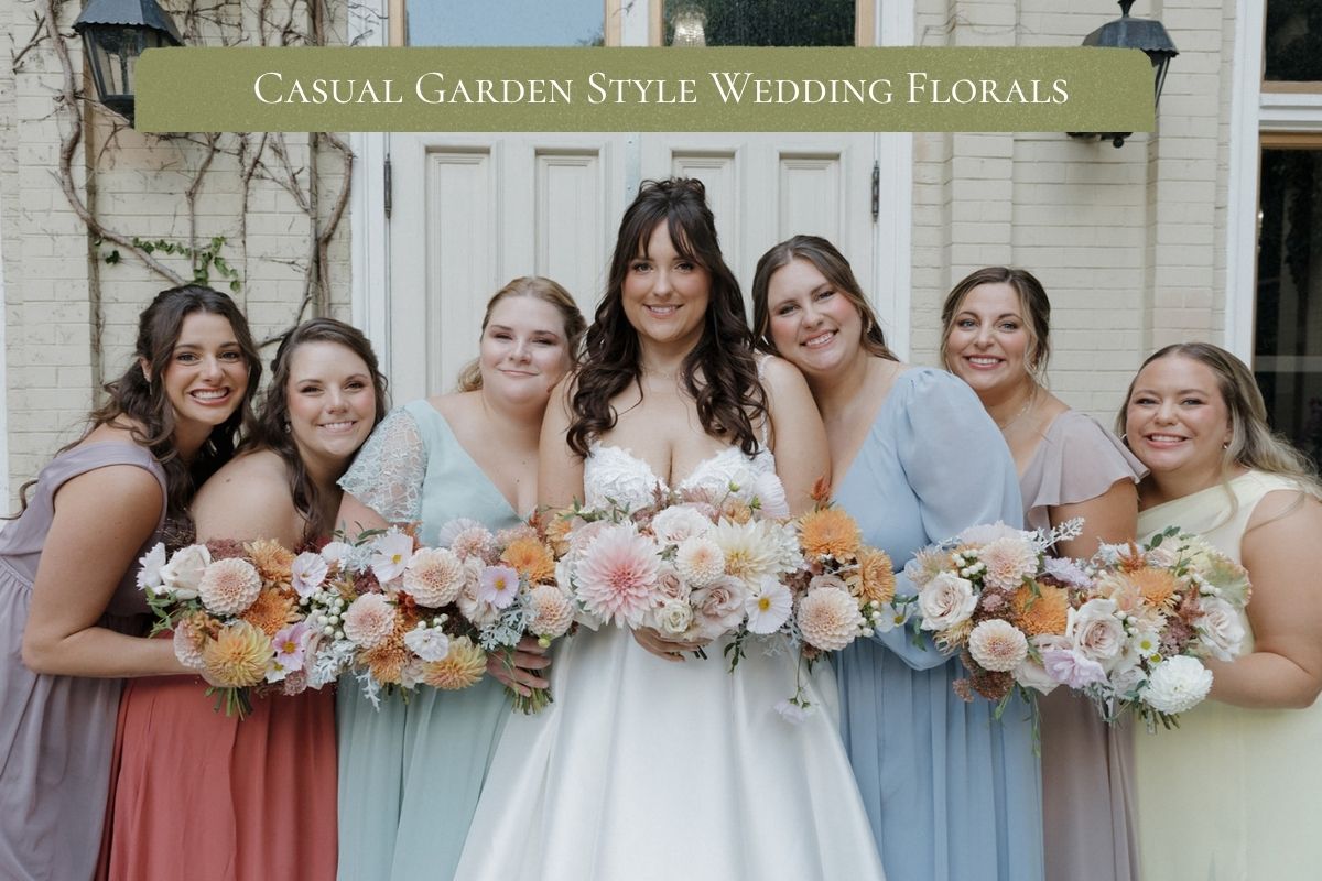 Bride and five bridesmaids holding peach and cream dahlia bouquets with text reading Casual Garden Style Wedding Florals